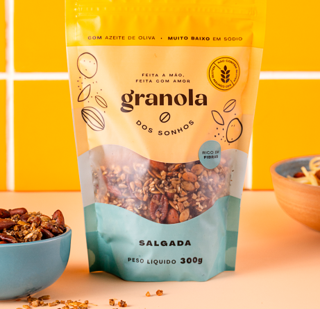 Photo of a man in a room using a tablet computer